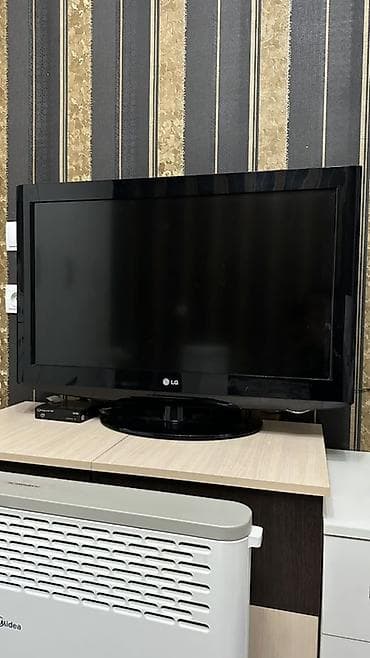 aoc 24g2: Телевизор LG, диагональ около 32" (80 см). ЖК-панель, черная глянцевая — 1