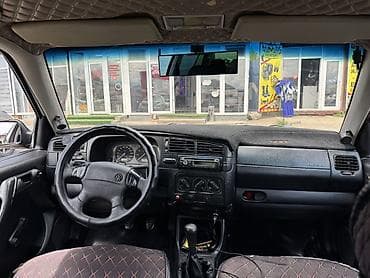 Унаа: Volkswagen Vento: 1994 г., 1.8 л, Кол менен иштөөчү, Бензин, Седан — 9