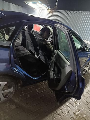 Продажа авто: Ford Focus: 2007 г., 1.6 л, Ручные, Бензин, Хэтчбэк — 10