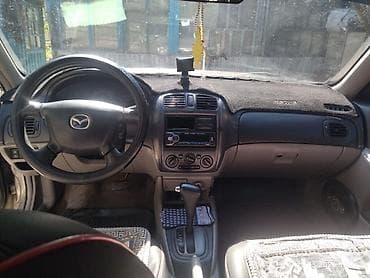 ваз дизель: Mazda 323: 2002 г., 1.6 л, Автомат, Бензин, Хэтчбэк — 6