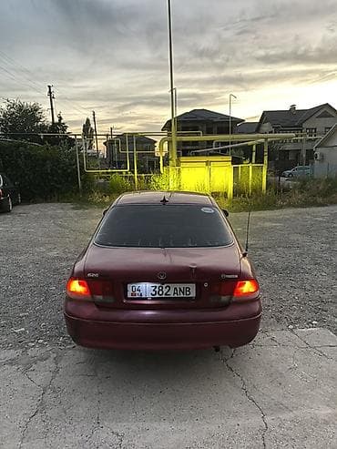 Транспорт: Mazda 626: 1992 г., 2 л, Механика, Бензин, Седан — 4