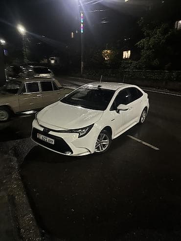 диски майбах 222: Toyota Corolla: 2022 г., Гибрид, Седан — 7
