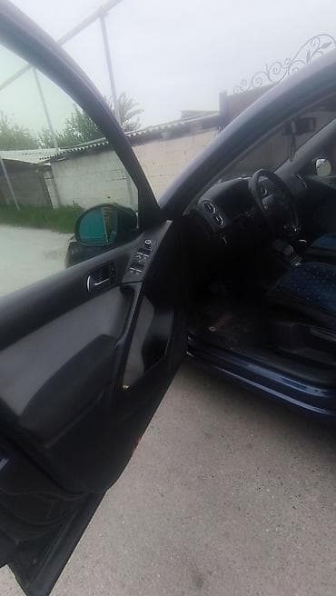 bid e2: Volkswagen Tiguan: 2011 г., Кроссовер — 5