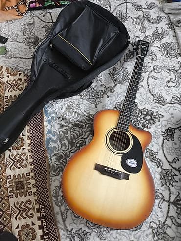 Акустическая гитара SAGA (Grand Auditorium с вырезом) - Форм‑фактор