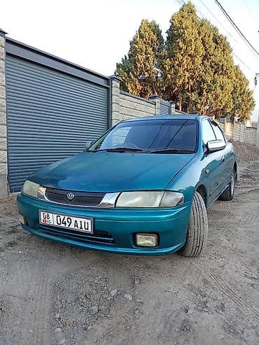ман коробка передач: Mazda Familia: 1997 г., 1.6 л, Автомат, Бензин, Седан — 1