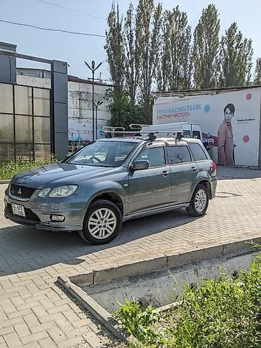 Продажа авто: Mitsubishi Airtrek: 2001 г., 2 л, Автомат, Газ, Кроссовер — 4