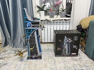 Детская одежда и обувь: Продается башня Мстителей в собранном виде Высота башни 90 см Ширина — 3