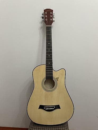 Акустическая гитара дредноут с вырезом (cutaway) - Корпус формата