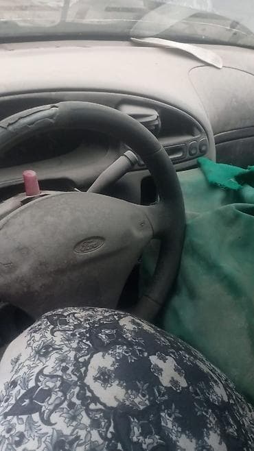 pasat b5: Ford Fiesta, хэтчбек 5‑дверный, черный цвет, номер К944УТ 32 RUS — 6
