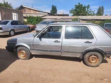 Унаа: Volkswagen Golf: 1989 г., 1.8 л, Кол менен иштөөчү, Бензин, Хетчбек — 3