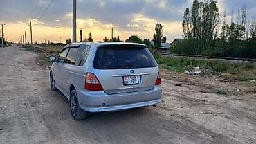 газовый коюч: Honda Odyssey: 2000 г. — 2