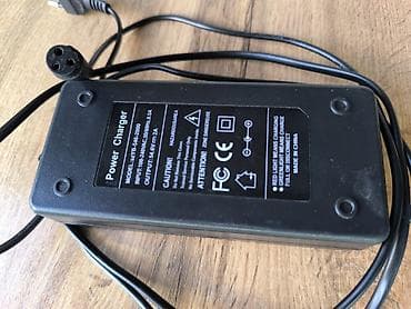 аккумулятор зарятник: Зарядное устройство для самокате. Модель: ES12V25-865-2000 Вход — 1