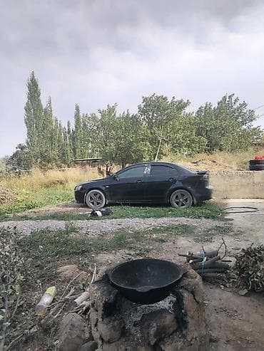 боковой тырмо: Mitsubishi Lancer: 2014 г., Седан — 1