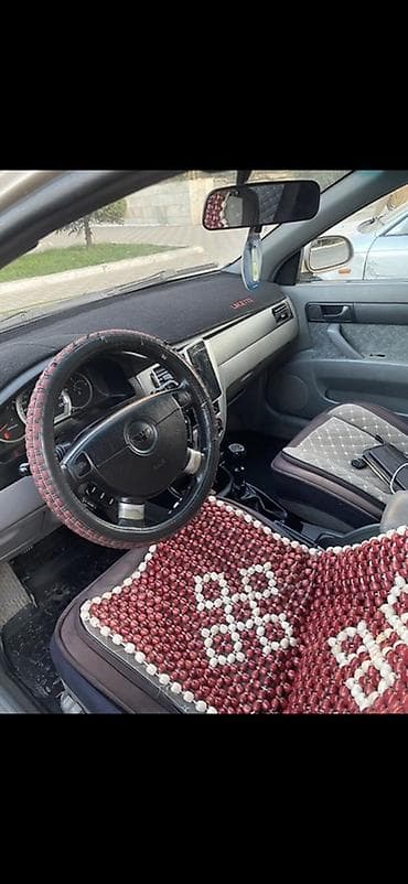 Унаа: Daewoo Lacetti: 2003 г., 1.6 л, Кол менен иштөөчү, Бензин, Седан — 8