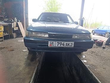 глушители выхлоп: Mazda 626: 1988 г., 2 л, Ручные, Газ, Универсал — 3