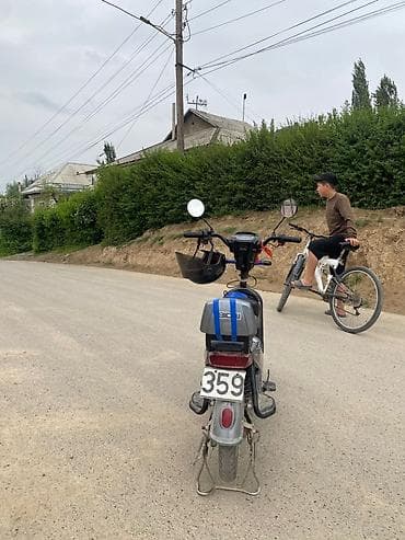 Мототехника: Электроскутер (городской) серого цвета Описание и особенности: - — 2
