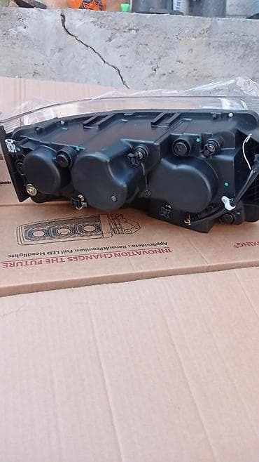 пленку: Комплект передних фар Renault 2012 г., Аналог, Китай — 4