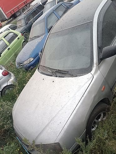 kia rio 1: Hyundai Elantra седан, серебристый цвет, кузов поколения начала 2005 — 1