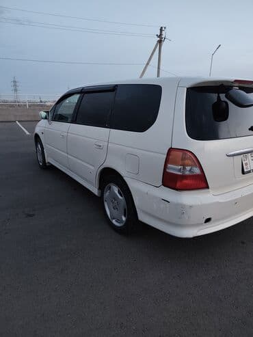 машина б у: Honda Odyssey: 2001 г., 2.3 л, Автомат, Газ, Минивэн — 8