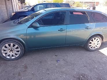 2 8: Nissan Primera: 2002 г., 2 л, Механика, Бензин, Универсал — 5