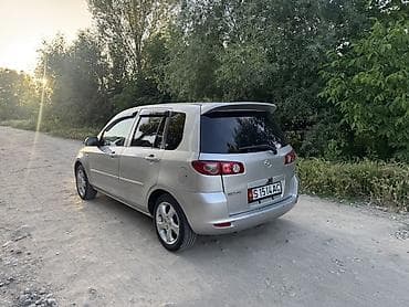 мазда катела: Mazda 2: 2006 г., 1.4 л, Механика, Газ, Хэтчбэк — 8