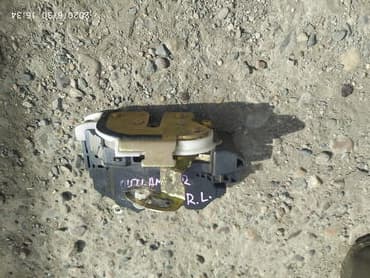 установка бронированных дверей: Mitsubishi Outlander Замок дверной центральный, Мицубиси Аутлендер — 1