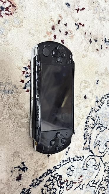Видеоигры: Портативная игровая консоль Sony PlayStation Portable (PSP) - Цвет — 1