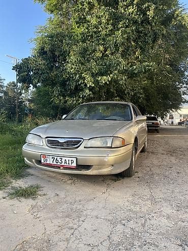 авто подборщик: Mazda 626: 1998 г., 2 л, Механика, Бензин, Седан — 1