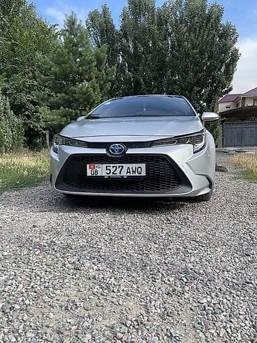 Транспорт: Toyota Corolla: 2021 г., Гибрид, Седан — 2