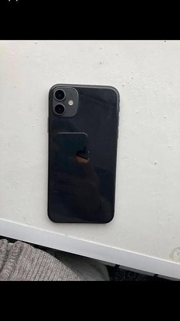 IPhone 11, черный цвет. Основные характеристики: - Экран 6.1"