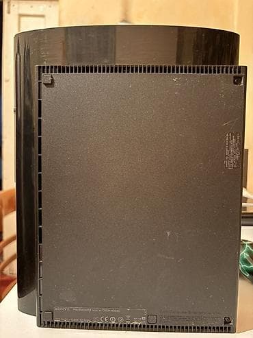 PS3 (Sony PlayStation 3): PlayStation 3 Super Slim (модель CECH-4003C) - Оригинальная консоль — 3