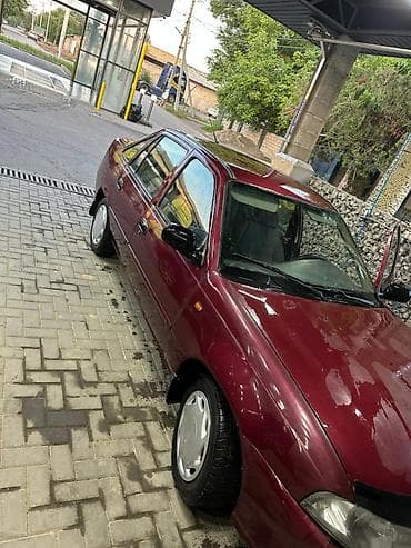 e500 124: Daewoo Nexia: 2011 г., Седан — 4