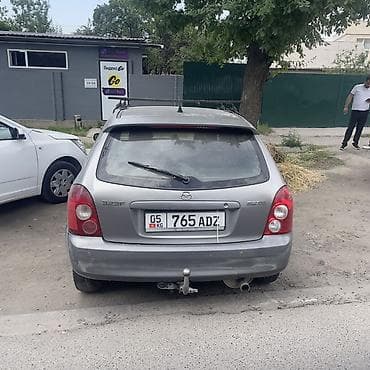 auto kg: Mazda 323: 2002 г., 1.6 л, Механика, Бензин, Универсал — 4