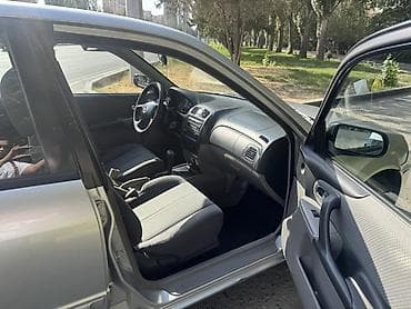 mazda 323 транспорт: Mazda 323: 2002 г., 1.6 л, Автомат, Бензин, Хэтчбэк — 6