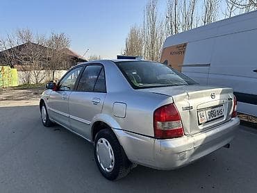 handa jazz: Mazda 323: 2002 г., 1.6 л, Механика, Бензин, Седан — 4