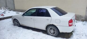 бонго мазда: Mazda Familia: 1999 г., 1.5 л, Автомат, Бензин, Седан — 6