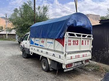 ручной машина: Hyundai Porter — компактный бортовой грузовик с тентованным кузовом — 7