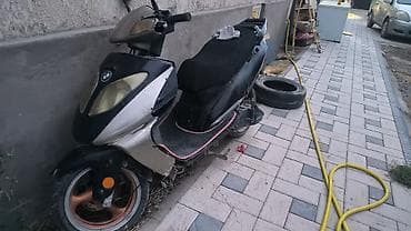 Скутер (бензиновый), компактный городской формат. - Кузов