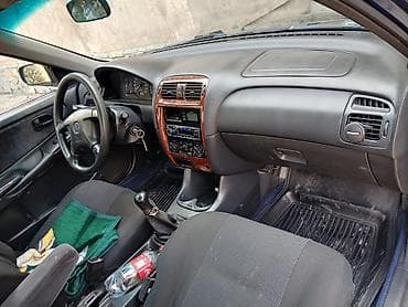 авто газ 66: Mazda 626: 1997 г., 1.8 л, Ручные, Бензин, Седан — 2