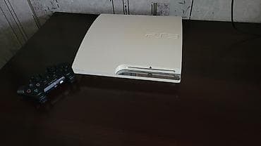 диск караоке: Игровая консоль Sony PlayStation 3 Slim (белая) - Серия PS3 Slim в — 1