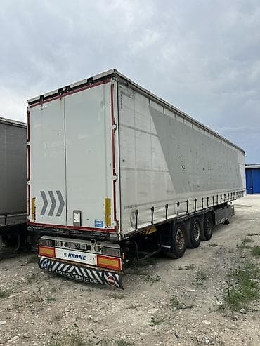 surron x: Полуприцеп-тент (шторный) KRONE, 3 оси - Тип: шторный полуприцеп — 2