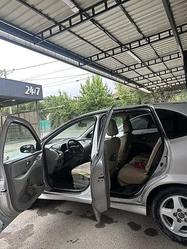 terrano 2: Nissan Tino: 2002 г., 1.8 л, Механика, Бензин, Хэтчбэк — 5
