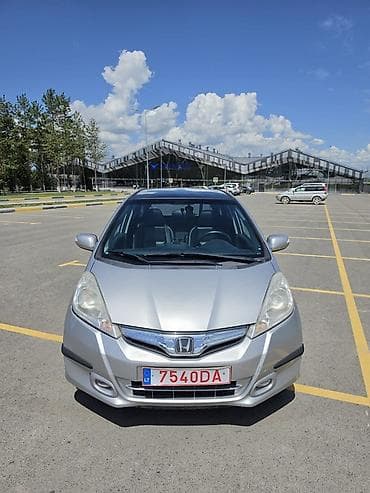 Транспорт: Honda Jazz: 2011 г., 1.3 л, Вариатор, Гибрид, Хэтчбэк — 5