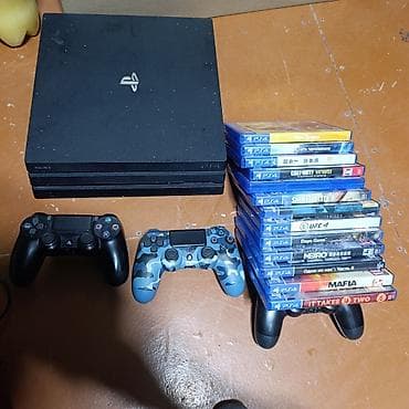 мото зарядка: PlayStation 4 Pro (черная) + 2 геймпада DualShock 4 + набор дисков ИЛИ — 1