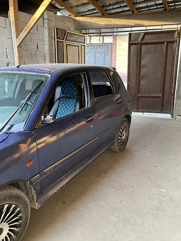 Унаа: Daihatsu Sirion: 2002 г., 1.3 л, Кол менен иштөөчү, Бензин, Хетчбек — 5