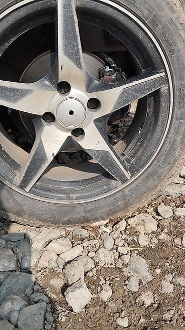 Шины: Литые Диски R 15 1 шт, отверстий - 4, Б/у — 1