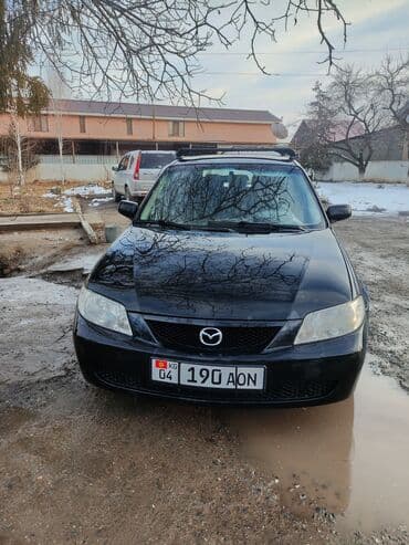 Продажа авто: Mazda 323: 2003 г., 1.6 л, Механика, Бензин, Универсал — 3