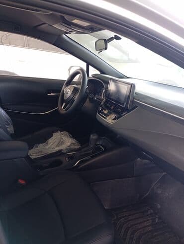 tayota runx: Toyota Corolla: 2020 г., 1.8 л, Автомат, Гибрид, Седан — 5