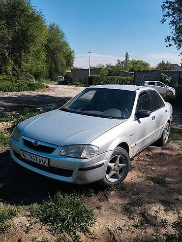 Продажа авто: Mazda 323: 1999 г., 1.6 л, Механика, Бензин, Седан — 3