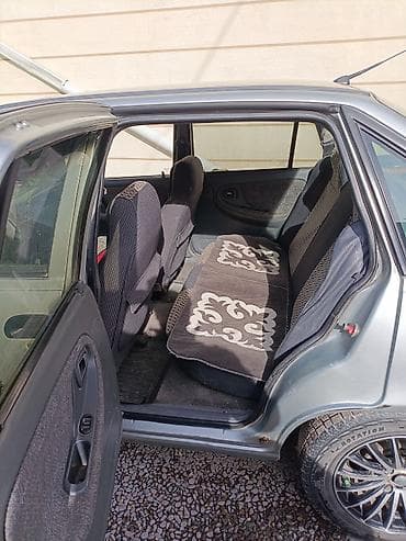 санта дн8: Daewoo Nexia: 2006 г., 1.5 л, Механика, Газ, Седан — 5